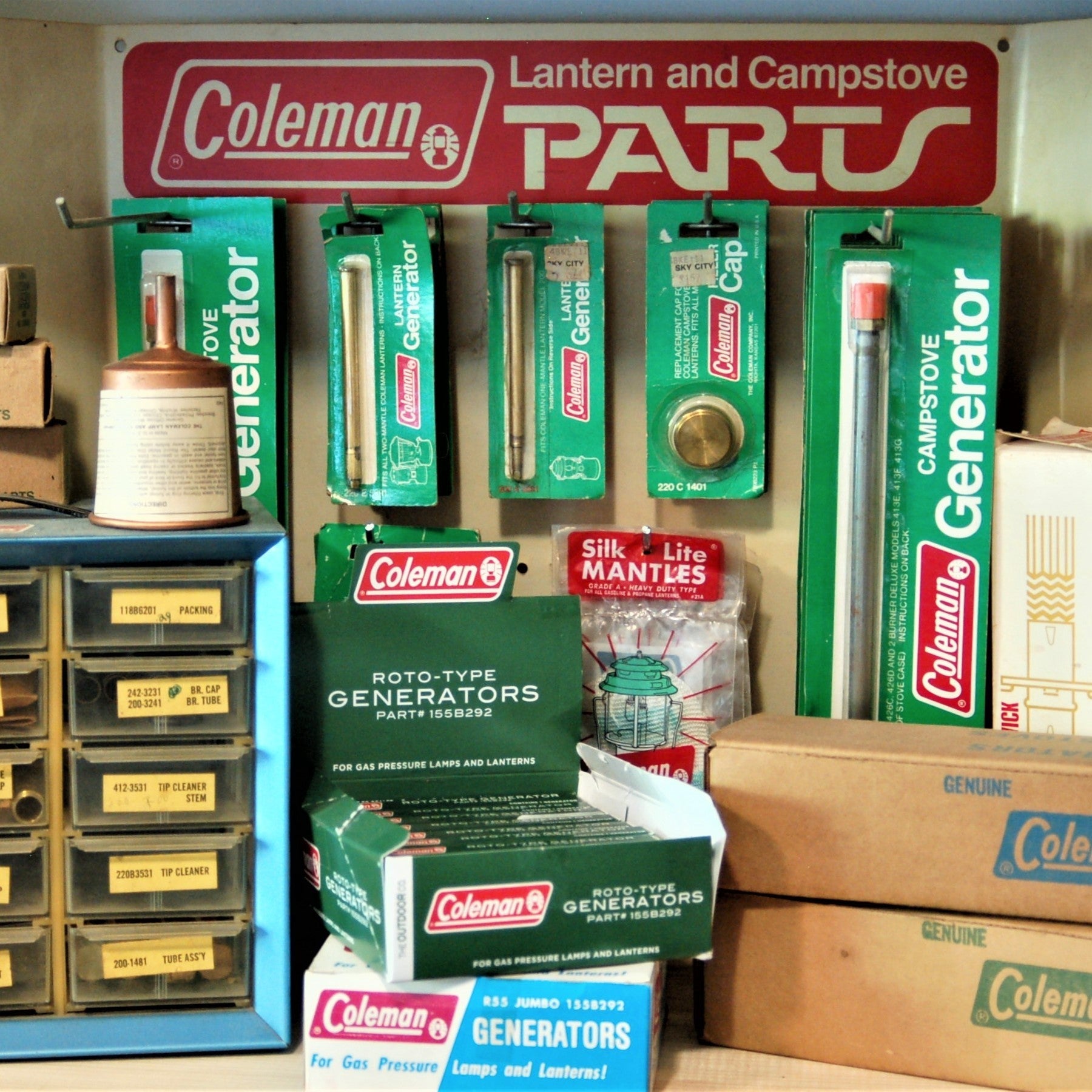 Hard-to-find Coleman lantern parts including valve assemblies, fuel caps, and repair components — from The GPA Junkyard